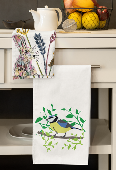 Blue Tit in a leaf wreath Tea Towel